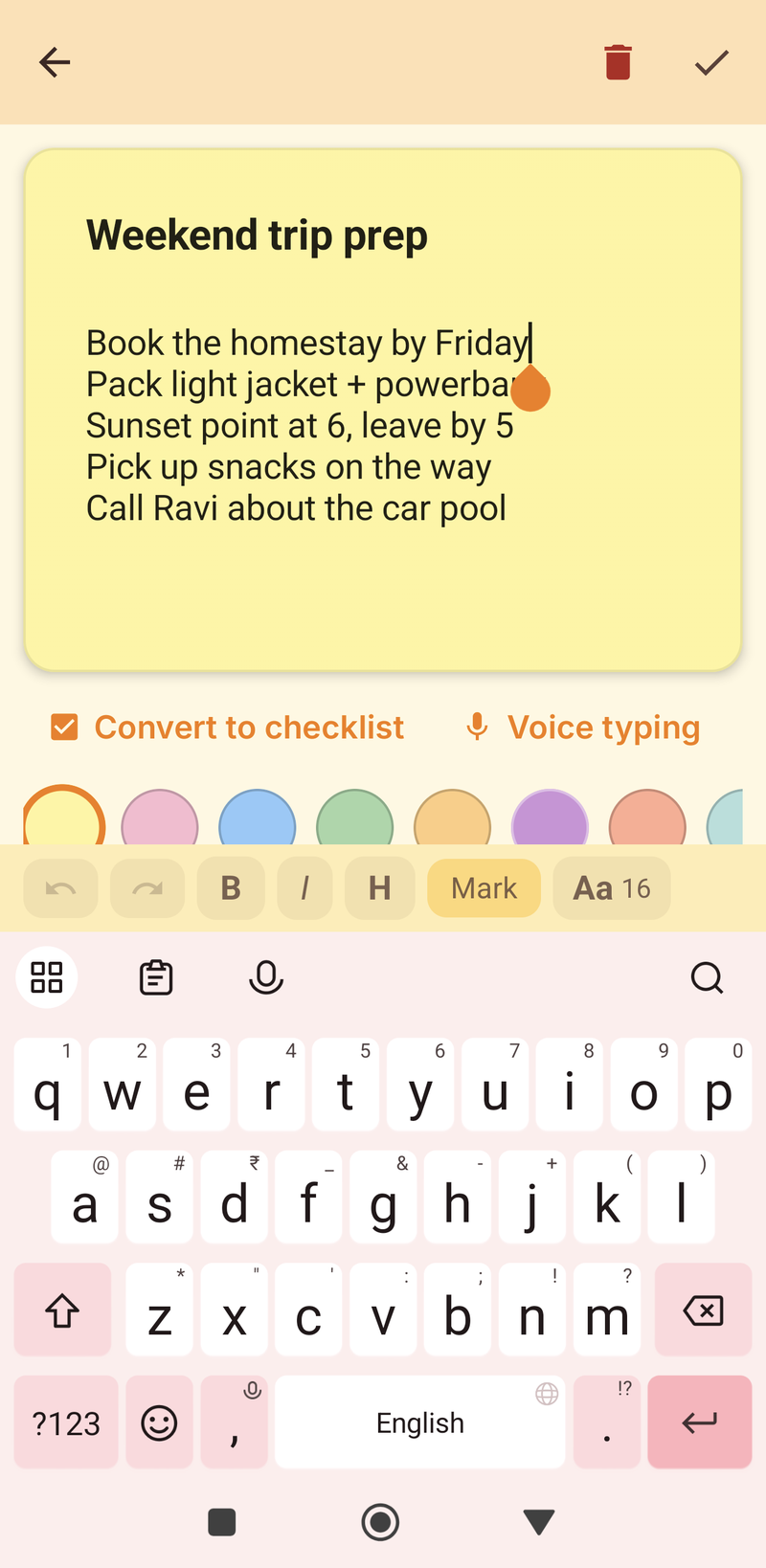 Note editor with the keyboard open and a toolbar pinned above it showing undo, redo, formatting and text size